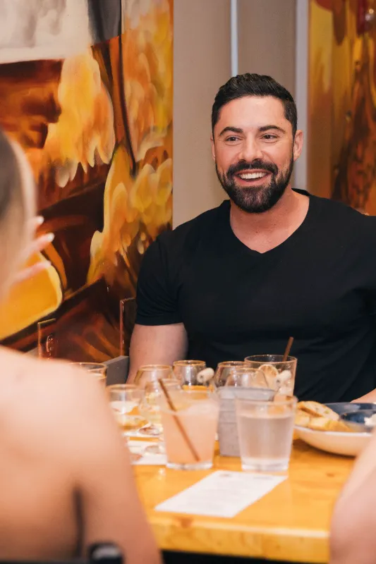 People enjoying a meal at Leftovers restaurant