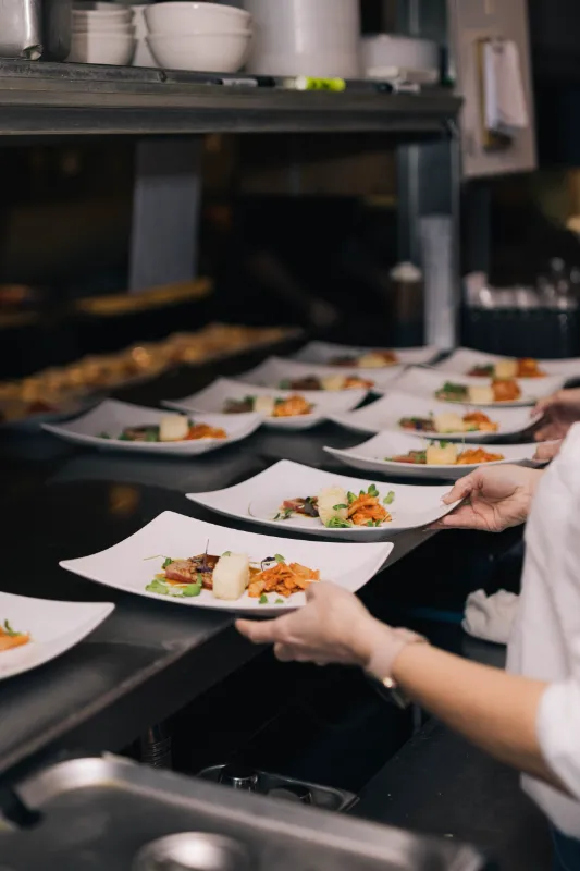 Plates of food ready to be served at Leftovers Restaurant