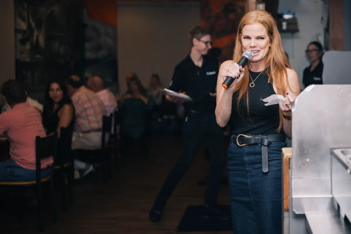 Lady talking over microphone